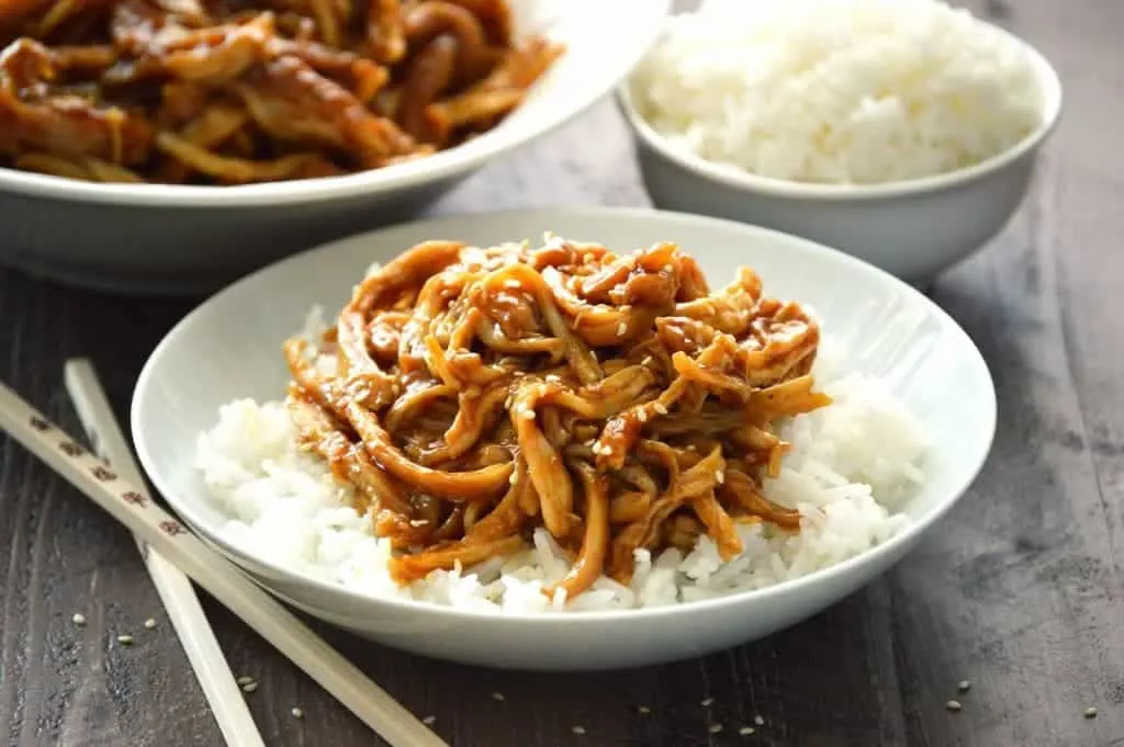 Crock Pot Teriyaki Chicken in a bowl with white rice