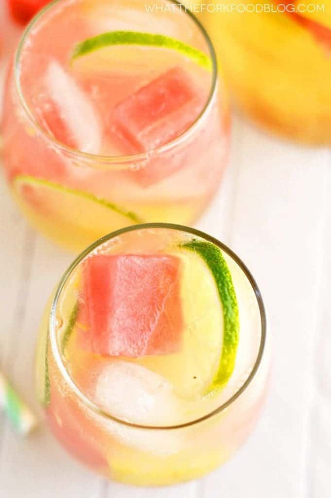 Up close of homemade summer sangria with pineapple and watermelon