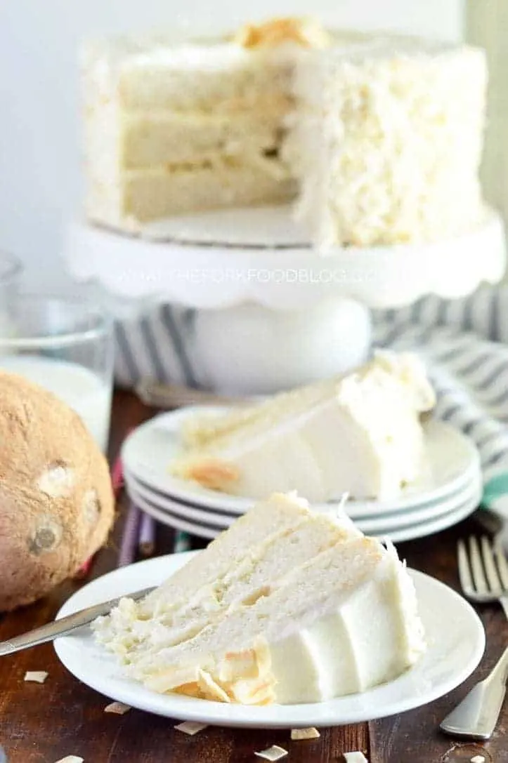 Gluten Free Coconut Cake (and dairy free). This cake is the ultimate dessert for coconut lovers! From @whattheforkblog | whattheforkfoodblog.com