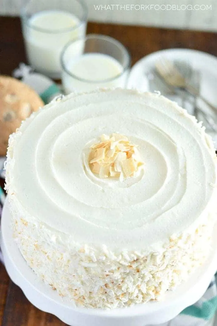 Gluten Free Coconut Cake (and dairy free). This cake is the ultimate dessert for coconut lovers! From @whattheforkblog | whattheforkfoodblog.com