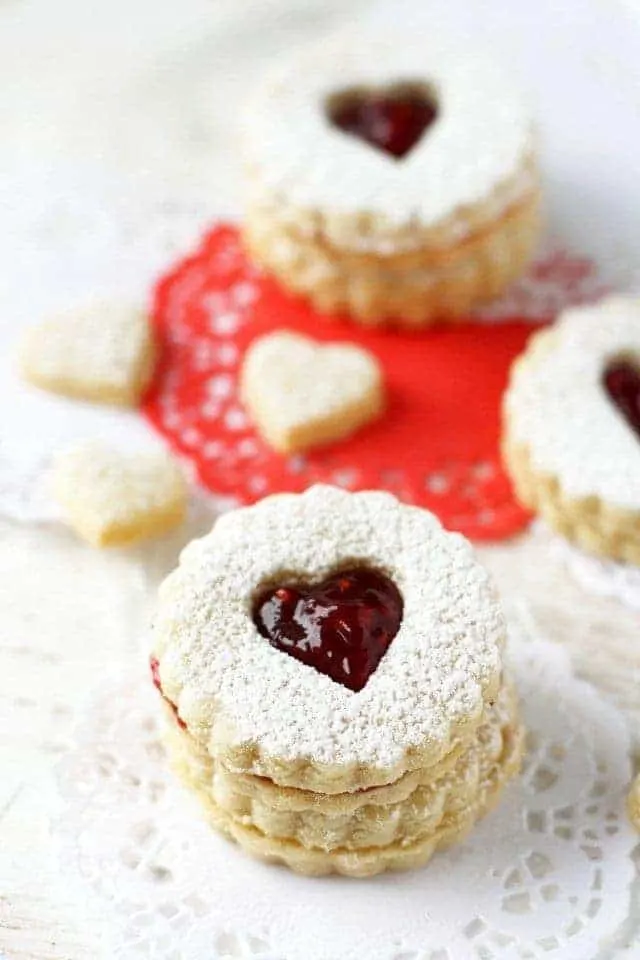 Gluten Free Linzer Cookies plus a complete list of gluten free Christmas cookies for all your holiday baking. @whattheforkblog | whattheforkfoodblog.com