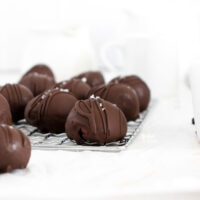 finished Easy Chocolate Truffles Recipe with truffles on a small wire rack