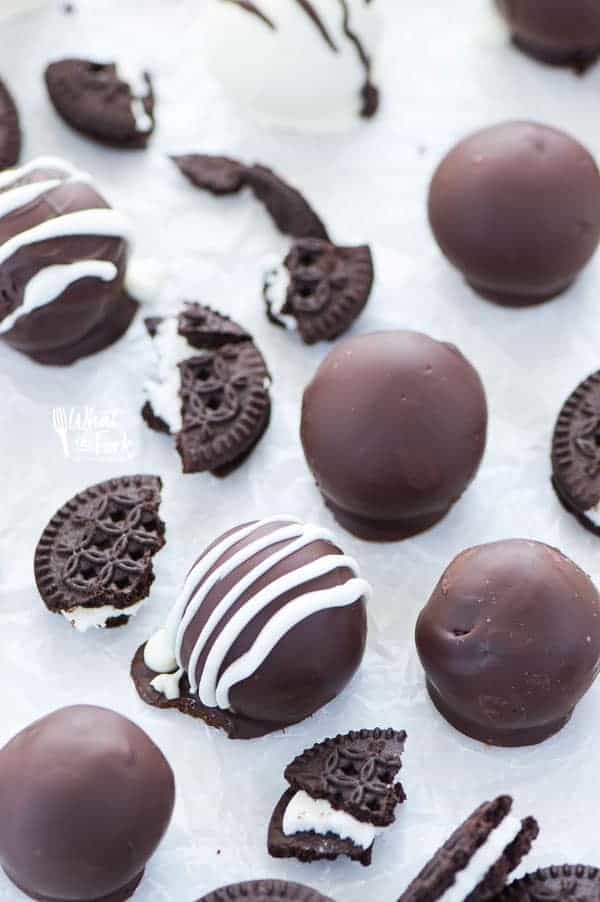 These Gluten Free Oreo Truffles are creamy in the center and coated in a crisp chocolate shell. Easy to make with minimal ingredients.They’re perfect for a homemade gift! Recipe from @whattheforkblog | whattheforkfoodblog.com | gluten free desserts | easy gluten free recipes | gluten free dessert recipes | no bake dessert recipes | #chocolate #Christmas #Oreo #glutenfree #dessert #easyrecipe #nobake #recipe