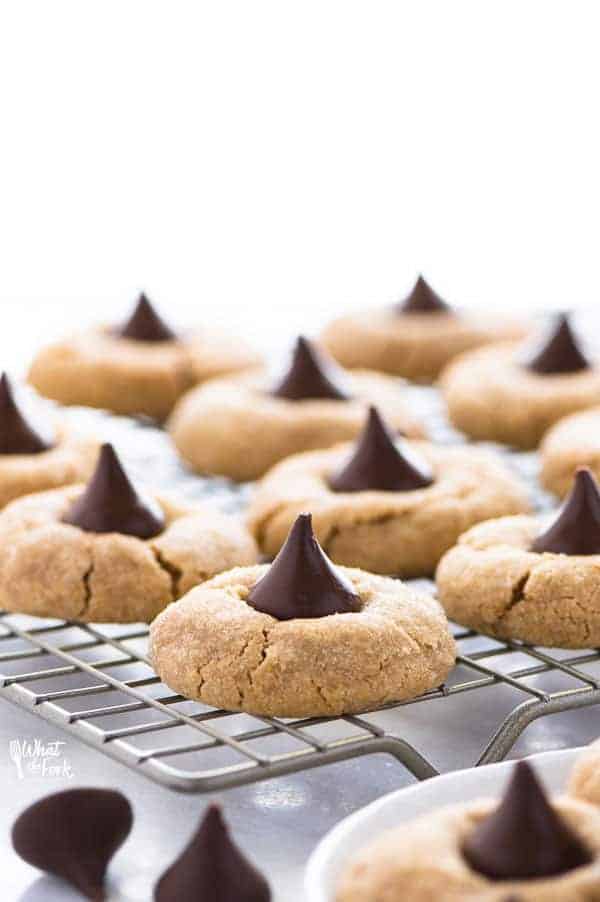 Gluten Free Peanut Butter Blossoms on a wire rack