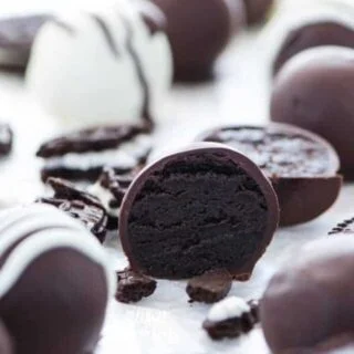 These Gluten Free Oreo Truffles are creamy in the center and coated in a crisp chocolate shell. Easy to make with minimal ingredients.They’re perfect for a homemade gift! Recipe from @whattheforkblog | whattheforkfoodblog.com | gluten free desserts | easy gluten free recipes | gluten free dessert recipes | no bake dessert recipes | #chocolate #Christmas #Oreo #glutenfree #dessert #easyrecipe #nobake #recipe