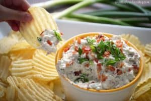 Super Easy Crack Dip - a sour cream based dip with ranch dip mix, cheese and bacon. Totally addicting! Crack Dip Pinterest recipe from @whattheforkblog | whattheforkfoodblog.com | crack dip cold | crack dip recipes | crack dip recipe | cheesy crack dip | crack dip with bacon | how to make crack dip | what is crack dip | award winning crack dip | game day recipes | gluten free appetizer recipes | gluten free dip recipes | easy dip recipes |