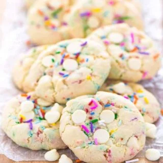 Super easy gluten free cake batter cookies! No chilling time required! Filled with white chocolate chips and loaded with sprinkles, these cookies are crave-worthy! Gluten free cookie recipe from @whattheforkblog | whattheforkfoodblog.com | homemade gluten free cookies | gluten free funfetti cookies | #sprinkles #cookies #funfetti #glutenfree #easyrecipes