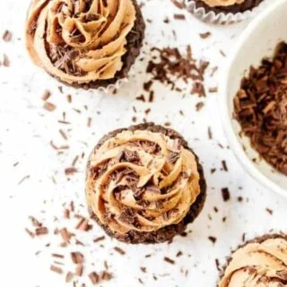 Gluten Free Chocolate Cupcakes for Two with Nutella Buttercream make a great dessert for Valentine’s Day or when you don’t want to make a big batch. This recipe makes just 4 cupcakes! These cupcakes can easily be made vegan with a few simple swaps! Recipe from @whattheforkblog | whattheforkfoodblog | small batch recipes | small batch cupcakes | homemade chocolate cupcakes | Valentine’s Day dessert recipes | easy cupcake recipes | #cupcakes #chocolate #glutenfree #easyrecipes #Nutella #dessert