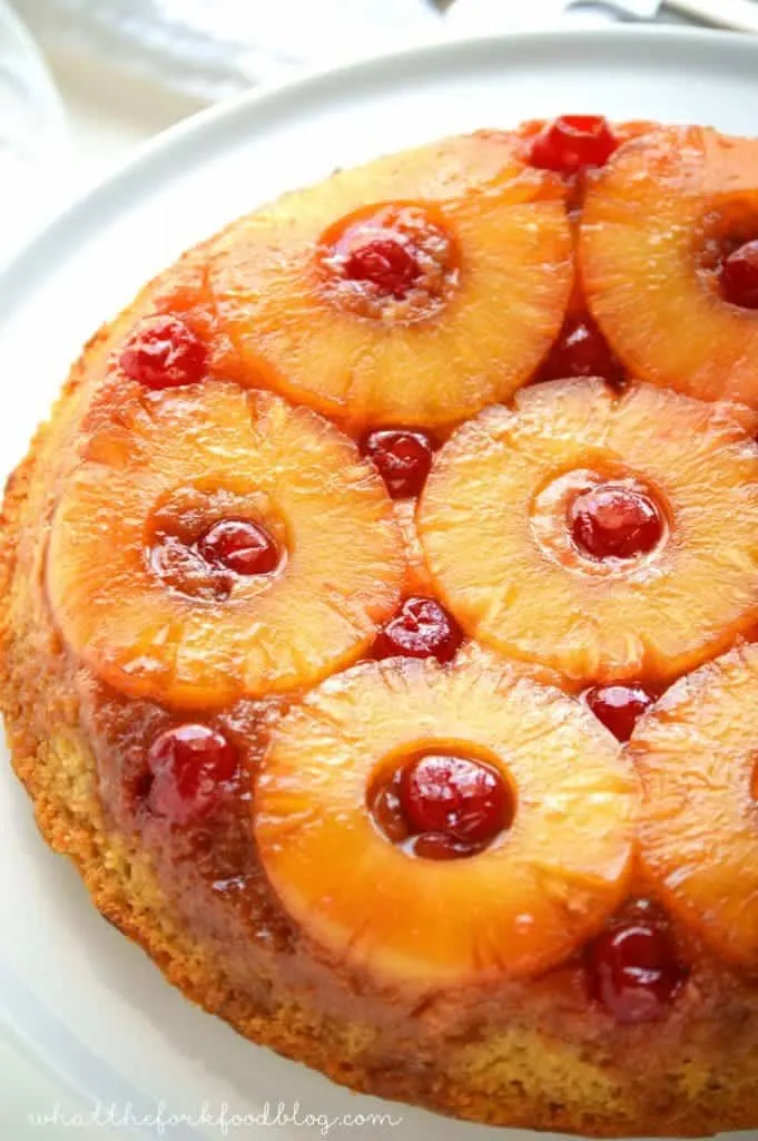 Easy and DELICIOUS gluten free pineapple upside-down cake! This recipe is a keeper and has gotten rave reviews! Easy gluten free dessert recipe from @whattheforkblog | whattheforkfoodblog.com