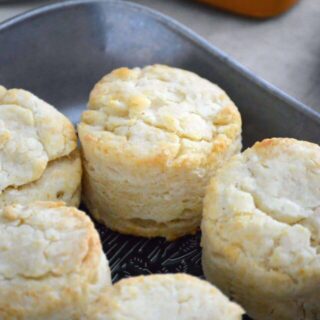 These easy and simple Gluten Free Biscuits are a adapted from my mom’s biscuit recipe. These buttery, flaky, fluffy gluten free biscuits are everything you want in a biscuit! Gluten free biscuit recipe from @whattheforkblog | whattheforkfoodblog | easy biscuit recipe | how to make biscuits | gluten free biscuits and gravy | fluffy gluten free biscuits | gluten free dairy free biscuits | dairy free option | homemade biscuits
