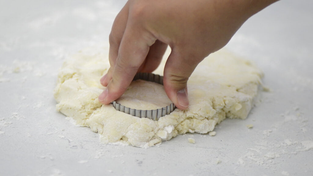 Use a 2 inch biscuit cutter to cut out the biscuits. Gently re-roll dough as needed.