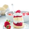 Gluten Free Strawberry Shortcake made with gluten free drop biscuits, sweetened strawberries, and homemade whipped cream.