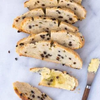 Gluten Free Irish Soda Bread buttered with bite taken