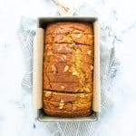This wildly popular Gluten Free Pumpkin Banana Bread is a mix of two popular quick bread recipes - pumpkin bread and banana bread! Your fall baking starts here! This recipe can be made dairy-free or with regular milk. This easy gluten free quick bread recipe is from @whattheforkblog - visit whattheforkfoodblog.com for more! #glutenfree #dairyfree #fallbaking #pumpkin #pumpkinrecipes #easyrecipes #glutenfreebaking #fallrecipes #Fall #pumpkinbread #bananabread #pumpkinbanana #quickbread #bread