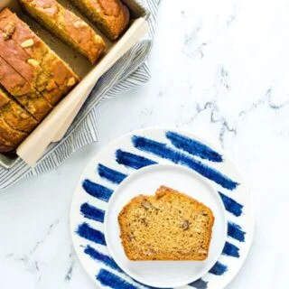 This wildly popular Gluten Free Pumpkin Banana Bread is a mix of two popular quick bread recipes - pumpkin bread and banana bread! Your fall baking starts here! This recipe can be made dairy-free or with regular milk. This easy gluten free quick bread recipe is from @whattheforkblog - visit whattheforkfoodblog.com for more! #glutenfree #dairyfree #fallbaking #pumpkin #pumpkinrecipes #easyrecipes #glutenfreebaking #fallrecipes #Fall #pumpkinbread #bananabread #pumpkinbanana #quickbread #bread