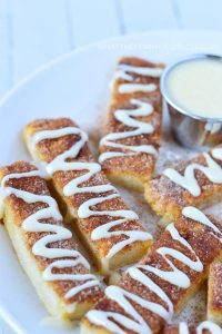 Gluten Free Cinnamon Sticks with cream cheese dipping sauce (dairy free). Recipe from @whattheforkblog | whattheforkfoodblog.com