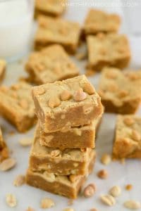 Gluten Free Peanut Butter Blondies (with dairy free option) packed full of flavor from peanuts 3 ways. Recipe from @whattheforkblog | whattheforkfoodblog.com | Sponsored by Naturally More