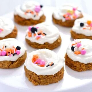 Gluten Free Pumpkin Cookies with Cream Cheese Frosting (dairy free option) are pillowy soft and melt in your mouth. Easy gluten free cookie recipe from @whattheforkblog | whattheforkfoodblog.com | gluten free dairy free pumpkin cookies | soft frosted pumpkin cookies | how to make pumpkin cookies | easy pumpkin cookie recipe | recipes with pumpkin | pumpkin cookie recipe | gluten free cookies | gluten free desserts | easy gluten free recipes | dairy free cookies | leftover pumpkin |