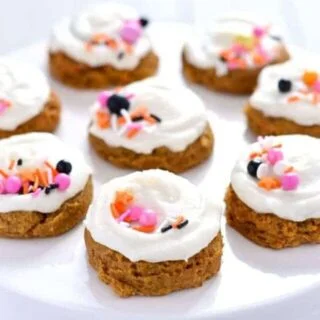 Gluten Free Pumpkin Cookies with Cream Cheese Frosting (dairy free option) are pillowy soft and melt in your mouth. Easy gluten free cookie recipe from @whattheforkblog | whattheforkfoodblog.com | gluten free dairy free pumpkin cookies | soft frosted pumpkin cookies | how to make pumpkin cookies | easy pumpkin cookie recipe | recipes with pumpkin | pumpkin cookie recipe | gluten free cookies | gluten free desserts | easy gluten free recipes | dairy free cookies | leftover pumpkin |