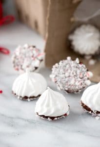 Chocolate Peppermint Dipped Meringue Cookies plus a complete list of gluten free Christmas cookies for all your holiday baking. | @whattheforkblog | whattheforkfoodblog.com