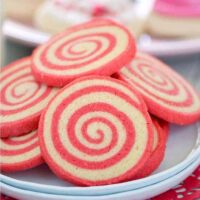 Sweet, crispy Gluten Free Cherry Pinwheel Cookies are a fun twist on a classic cookie recipe and are easier to make then you’d think. The pretty red swirl also makes them great for Valentine’s Day! Recipe from @whattheforkblog | whattheforkfoodblog.com | gluten free cookie recipes | pinwheel cookie recipes | how to make pinwheel cookies