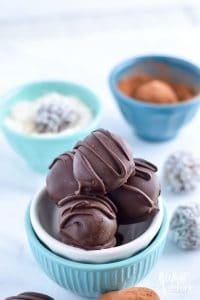 Easy Paleo Chocolate Truffles are so rich and creamy! Plus recipe included 3 ways to top them. Recipe from @whattheforkblog | whattheforkfoodblog.com | healthy recipes | healthy desserts | easy desserts | how to make truffles | dairy free truffles