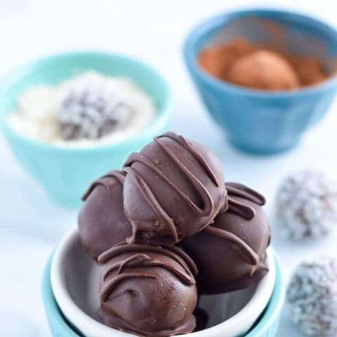 Easy Paleo Chocolate Truffles are so rich and creamy! Plus recipe included 3 ways to top them. Recipe from @whattheforkblog | whattheforkfoodblog.com | healthy recipes | healthy desserts | easy desserts | how to make truffles | dairy free truffles