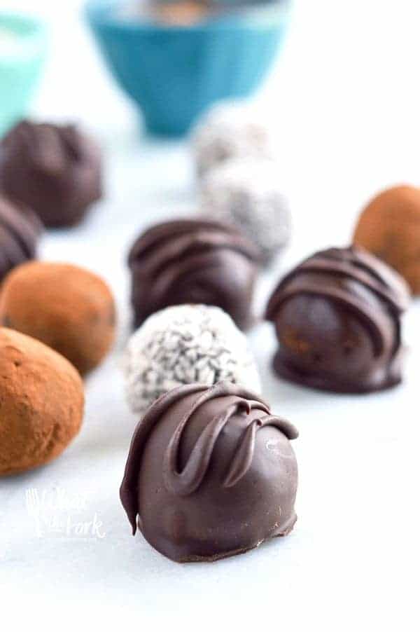 Easy Paleo Chocolate Truffles are so rich and creamy! Plus recipe included 3 ways to top them. Recipe from @whattheforkblog | whattheforkfoodblog.com | healthy recipes | healthy desserts | easy desserts | how to make truffles | dairy free truffles | naturally sweetened