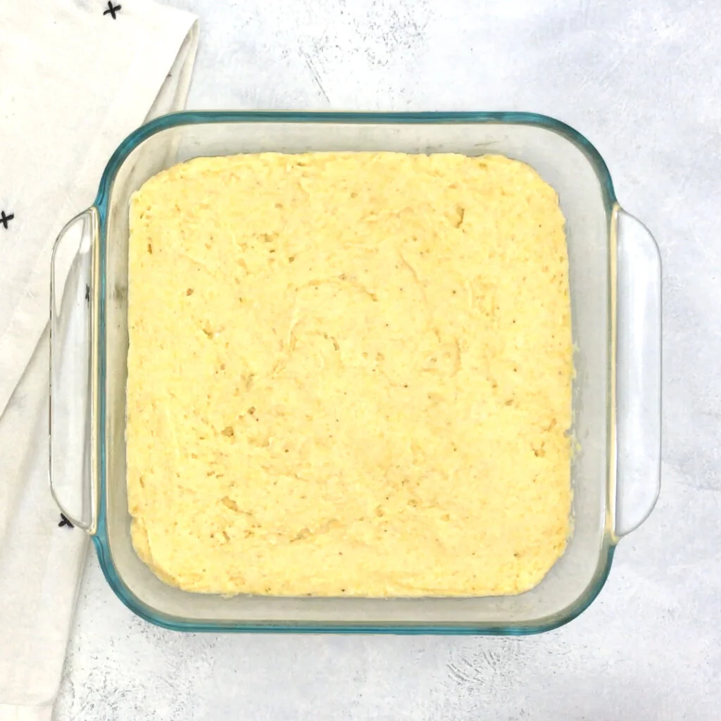 Pour the batter into a prepared 8×8 square baking pan (parchment paper or non-stick spray) and smooth out with spatula. Bake at 400 degrees for 20-24 minutes.