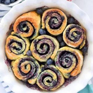 1-Hour Gluten Free Blueberry Sweet Rolls - perfect for brunch! Recipe from @whattheforkblog | whattheforkfoodblog.com | Sponsored by Bonne Maman | gluten free baking | easy gluten free recipes | gluten free bread recipes | yeast rolls | brunch recipes | sweet roll recipes | homemade dough recipes |