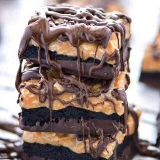 Gluten Free Samoas Brownies - these are way better than the cookie! Coconut, caramel, and a heavy dose of chocolate! Recipe from @whattheforkblog | whattheforkfoodblog.com | easy gluten free desserts | gluten free brownie recipes | the best gluten free desserts | Samoas recipes | gluten free brownies from scratch