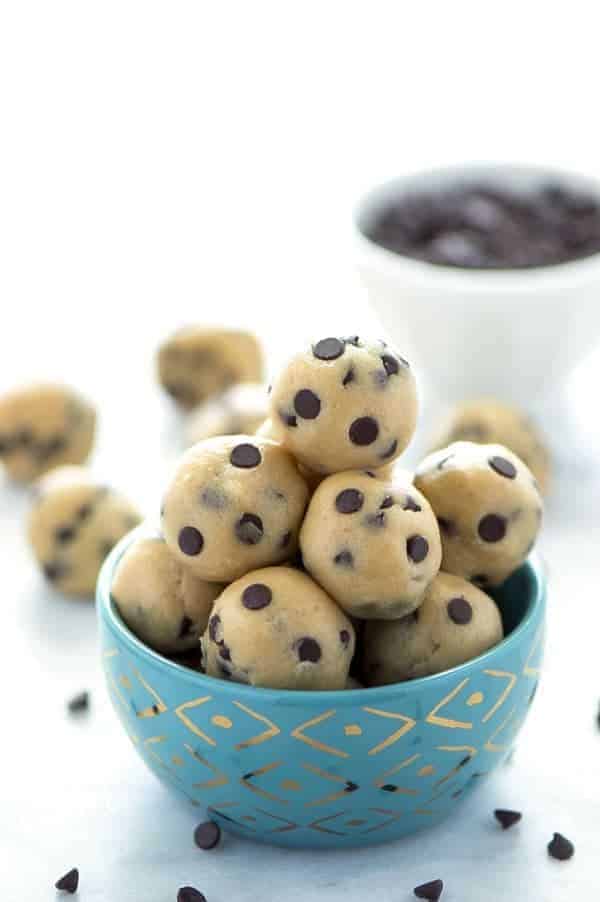 Gluten Free Edible Chocolate Chip Cookie Dough (egg free recipe with a dairy free + vegan option). No bake chocolate chip cookie dough bites. Recipe from @whattheforkblog | whattheforkfoodblog.com | easy gluten free desserts | no-bake recipes | summer desserts | edible cookie dough | gluten free dairy free recipes #glutenfree #vegan #cookiedough #chocolatechip #chocolate