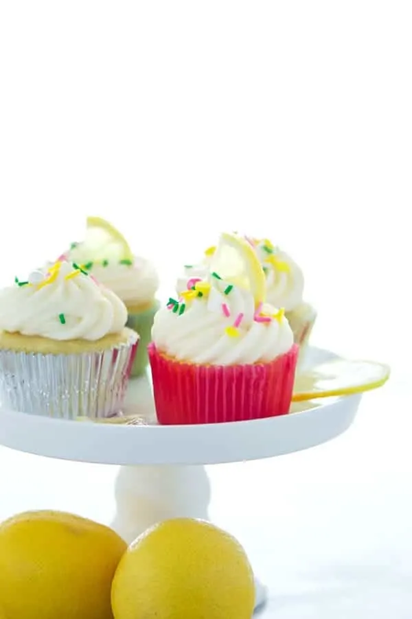 Gluten Free Lemon Cupcakes with Cream Cheese Frosting - these are full of lemon flavor with the perfect cake texture! Recipe from @whattheforkblog | whattheforkfoodblog | gluten free cupcakes | gluten free desserts | gluten free baking | gluten free cake recipes | birthday cake ideas | cupcake recipes | lemon desserts