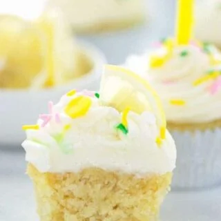 Gluten Free Lemon Cupcakes with Cream Cheese Frosting - these are full of lemon flavor with the perfect cake texture! Recipe from @whattheforkblog | whattheforkfoodblog | gluten free cupcakes | gluten free desserts | gluten free baking | gluten free cake recipes | birthday cake ideas | cupcake recipes | lemon desserts