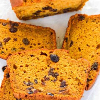 This is the best gluten free pumpkin recipe! It's a classic made with raisins (which are optional) and made with full can of pumpkin. This is a fall must-make! Easy gluten free recipe from @whattheforkblog | whattheforkfoodblog.com | pumpkin recipes | gluten free bread recipes | classic pumpkin bread | gluten free baking | gluten free breakfast recipes | quick bread recipes | pumpkin puree | dairy free recipes | recipes with pumpkin #glutenfree #pumpkinbread