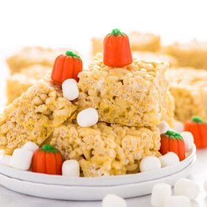 Gluten Free Pumpkin Spice Rice Krispies Treats are the perfect fall flavored no-bake treat. They've got that pumpkin spice flavor you love without having to turn on the oven. They're really easy to make too! Recipe from @whattheforkblog | whattheforkfoodblog.com | easy gluten free desserts | no-bake dessert recipes | homemade rice krispies treats | pumpkin spice recipes | fall recipes | easy dessert recipes | flavors for Rice Krispies Treats | homemade dessert recipes | updated classics