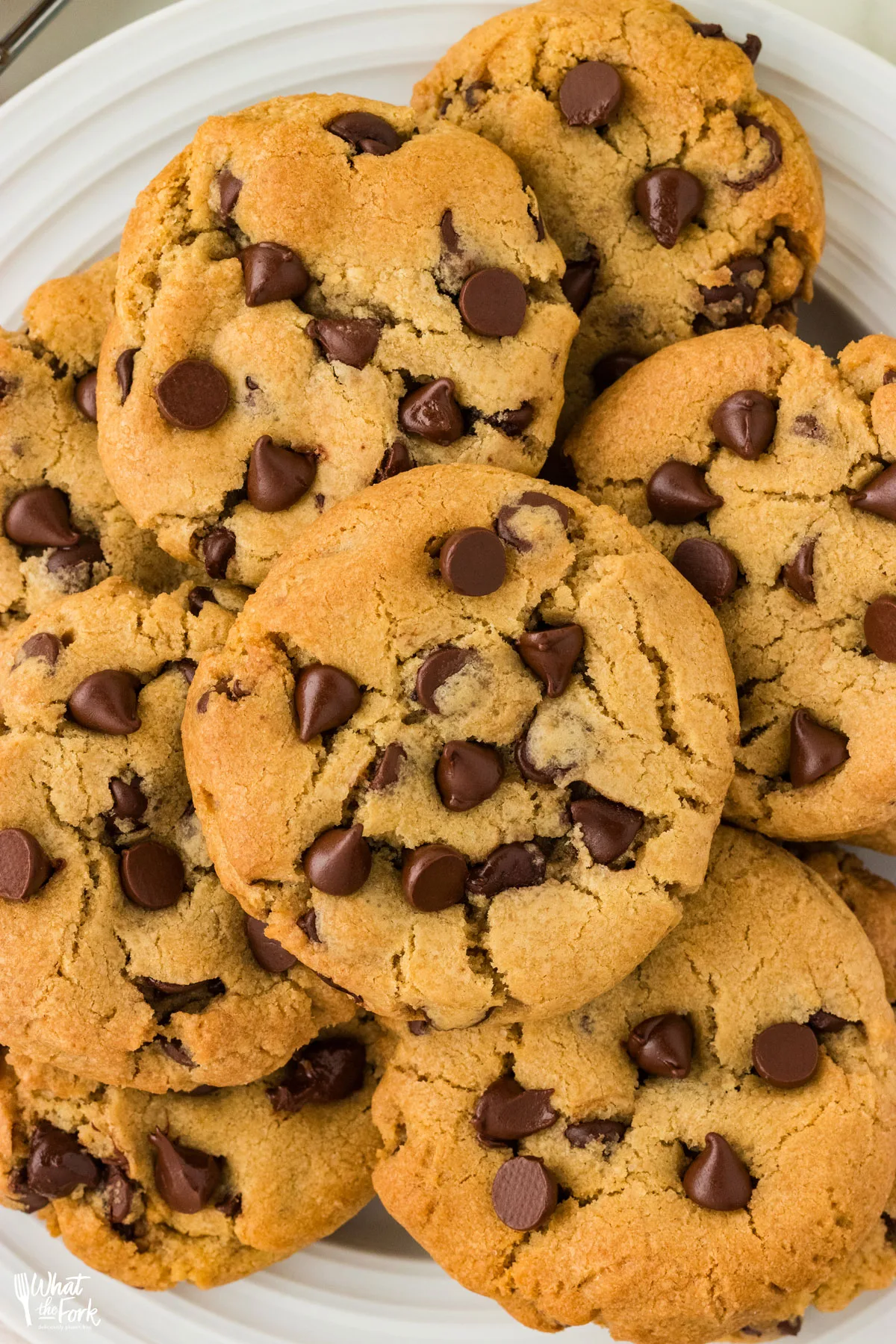 a plate of baked Thick and Chewy Gluten Free Chocolate Chip Cookies
