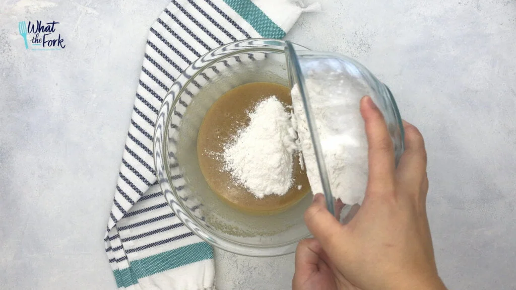 Pour the dry ingredients into the wet ingredients.