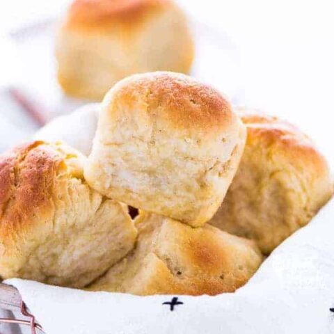These gluten free dinner rolls are soft with a nice chew to it - just like regular wheat rolls! If you've been missing real dinner rolls, try this recipe! Plus, they’re much easier to make than you’d think! From @whattheforkblog | whattheforkfoodblog.com | gluten free bread recipes | gluten free rolls | yeast rolls | gluten free yeast rolls | gluten free bread recipes #glutenfree #dinnerrolls #yeastrolls #glutenfreebaking #easyrecipes #glutenfreerecipes #glutenfreebread #bread #recipes