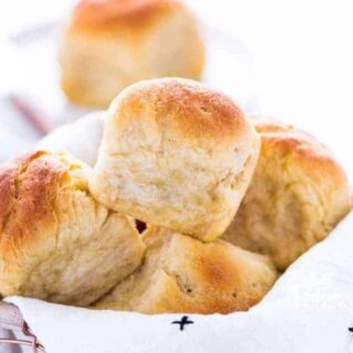 These gluten free dinner rolls are soft with a nice chew to it - just like regular wheat rolls! If you've been missing real dinner rolls, try this recipe! Plus, they’re much easier to make than you’d think! From @whattheforkblog | whattheforkfoodblog.com | gluten free bread recipes | gluten free rolls | yeast rolls | gluten free yeast rolls | gluten free bread recipes #glutenfree #dinnerrolls #yeastrolls #glutenfreebaking #easyrecipes #glutenfreerecipes #glutenfreebread #bread #recipes