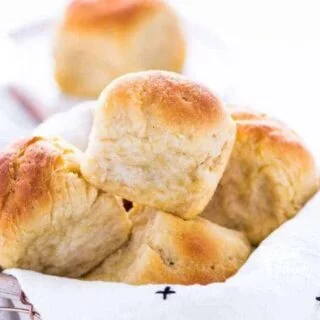 These gluten free dinner rolls are soft with a nice chew to it - just like regular wheat rolls! If you've been missing real dinner rolls, try this recipe! Plus, they’re much easier to make than you’d think! From @whattheforkblog | whattheforkfoodblog.com | gluten free bread recipes | gluten free rolls | yeast rolls | gluten free yeast rolls | gluten free bread recipes #glutenfree #dinnerrolls #yeastrolls #glutenfreebaking #easyrecipes #glutenfreerecipes #glutenfreebread #bread #recipes