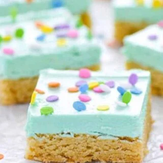 Soft gluten free sugar cookie bars that will bring smiles to the faces of all who eat them! Easier to make than cut out sugar cookies with the same flavor you love. Don’t forget the sprinkles! Recipe from @whattheforkblog | whattheforkfoodblog.com | gluten free dessert recipes | gluten free desserts | easy gluten free sugar cookies | bar cookie recipes | easy gluten free recipes | vanilla buttercream frosting recipe | #glutenfree #easyrecipes #glutenfreedessert #dessert #sugarcookies #barcookies #glutenfreecookies