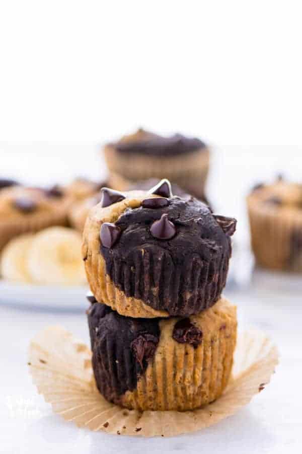 Gluten free vegan banana split muffins are a great way to use up old bananas, especially if you want to try something different from banana bread or banana muffins. This muffin recipe is easy to make, freeze well, and are great for breakfast on busy mornings! @whattheforkblog | whattheforkfoodblog.com | |vegan breakfast recipes | gluten free recipes | easy breakfast recipes | homemade muffins | chocolate muffin recipes | recipes with bananas | #breakfast #muffins #glutenfree #vegan #easyrecipes