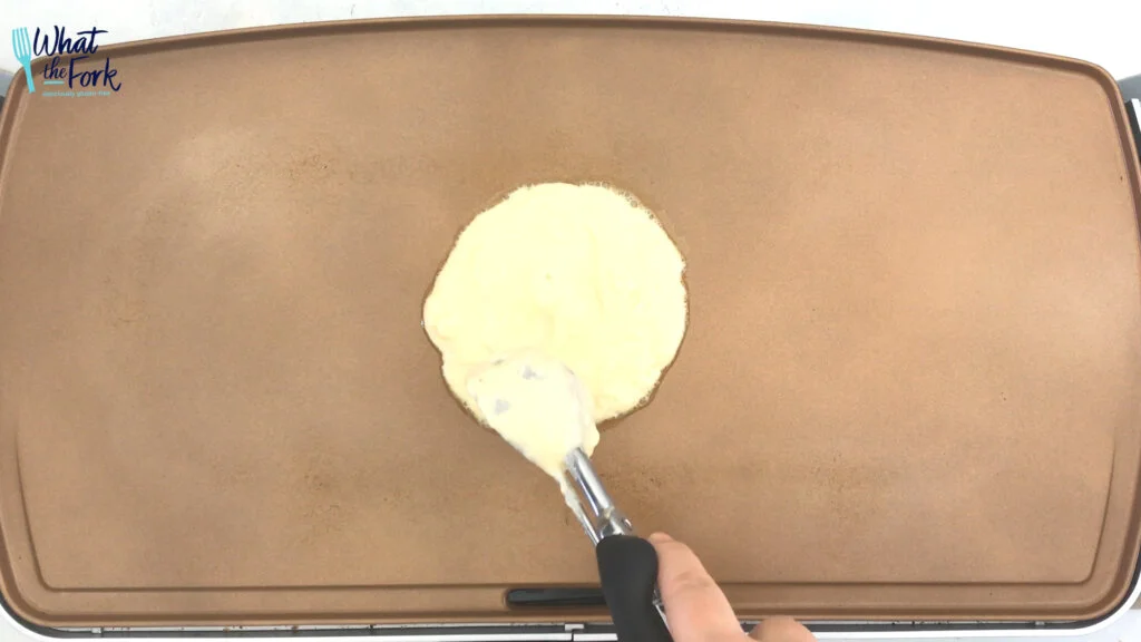 Make sure to preheat before adding the pancakes. When the griddle is hot, scoop the batter onto the griddle, about 3 tablespoons-1/4 cup at a time.