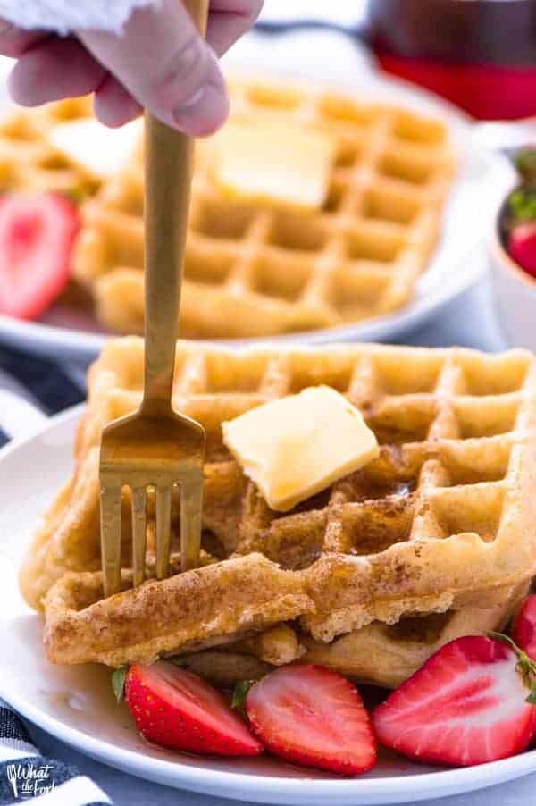 This easy gluten free waffle recipe is a family favorite. We make these waffles almost once a week! They also freeze well so you can make extra for later! They get nice and crispy too, like a Eggo waffles. There’s a dairy free option too! Gluten free breakfast recipe from @whattheforkblog | whattheforkfoodblog.com | how to make gluten free waffles | easy recipe for gluten free waffles | brunch recipes | homemade waffles #glutenfree #waffles #breakfast #dairyfree #easyrecipes #brunch #kidfriendly