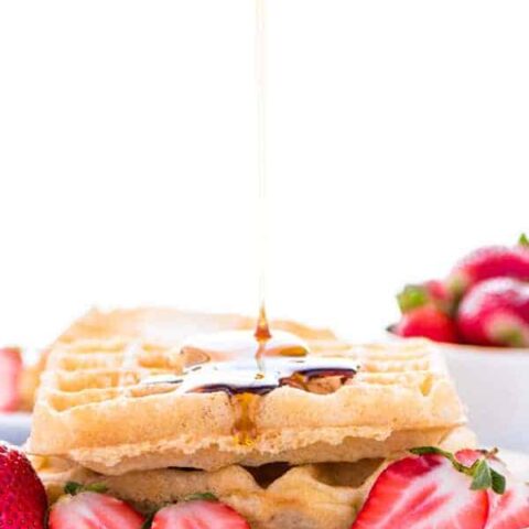 This easy gluten free waffle recipe is a family favorite. We make these waffles almost once a week! They also freeze well so you can make extra for later! They get nice and crispy too, like a Eggo waffles. There’s a dairy free option too! Gluten free breakfast recipe from @whattheforkblog | whattheforkfoodblog.com | how to make gluten free waffles | easy recipe for gluten free waffles | brunch recipes | homemade waffles #glutenfree #waffles #breakfast #dairyfree #easyrecipes #brunch #kidfriendly