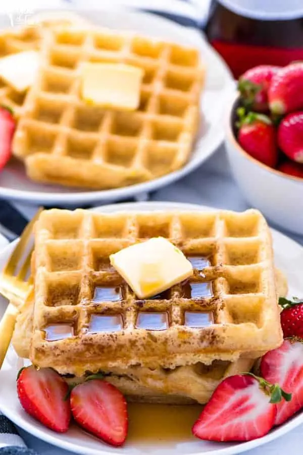 Buttered gluten free waffle drizzled with maple syrup.