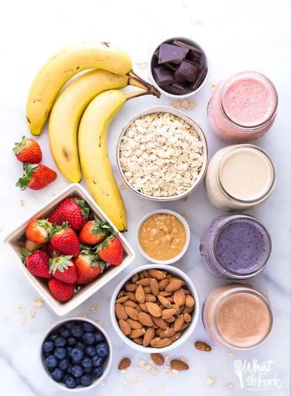 How to make oatmeal smoothies 4 ways - perfect for healthy meal prep! These oatmeal smoothies are gluten free, dairy free, naturally sweetened, healthy, and filling. They make such a great easy breakfast! Oatmeal smoothie recipe from @whattheforkblog | whattheforkfoodblog.com | oatmeal smoothies | healthy meal prep | healthy breakfast recipes | easy smoothie recipes | oatmeal recipes | oatmeal smoothies healthy breakfast #glutenfree #smoothies #oatmealsmoothies #oatmeal #dairyfree #healthy #breakfast