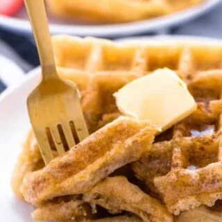 This easy gluten free waffle recipe is a family favorite. We make these waffles almost once a week! They also freeze well so you can make extra for later! They get nice and crispy too, like a Eggo waffles. There’s a dairy free option too! Gluten free breakfast recipe from @whattheforkblog | whattheforkfoodblog.com | how to make gluten free waffles | easy recipe for gluten free waffles | brunch recipes | homemade waffles #glutenfree #waffles #breakfast #dairyfree #easyrecipes #brunch #kidfriendly