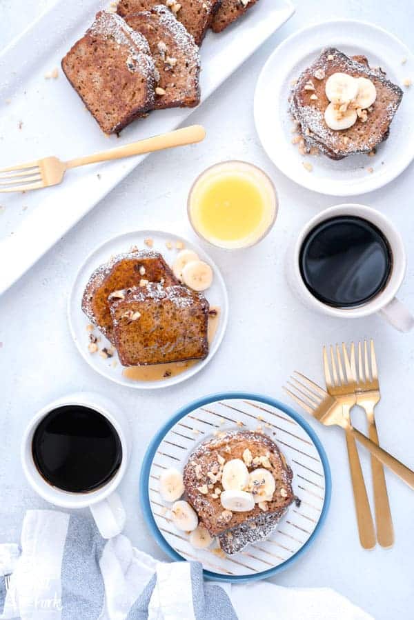 Did you make gluten free banana bread recently and have some leftover? Turn it into Banana Bread French Toast! It’s great for breakfast, brunch, or breakfast for dinner! Top it with some sliced bananas, chopped walnuts, and pure maple syrup. Recipe from @whattheforkblog | whattheforkfoodblog.com | gluten free breakfast recipes | recipes for brunch | how to make French Toast with quick bread | #brunch #breakfast #frenchtoast #glutenfree #bananabread #easyrecipes